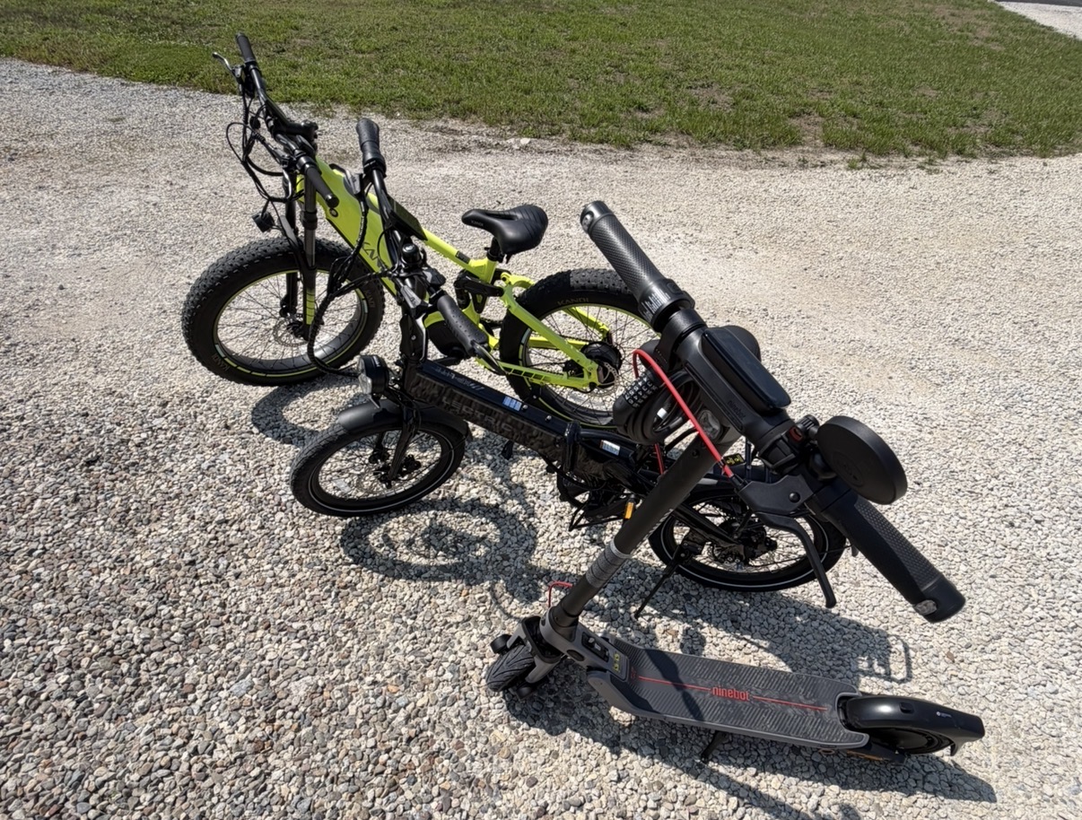 Rydvolt rental lineup with Kandi full-size e-bike, Lectric folding e-bike and Segway electric scooter